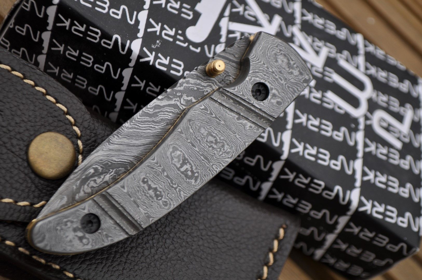 Damascus Folding Knife with handmade Leather Pouch - Work Of Art By Koobi